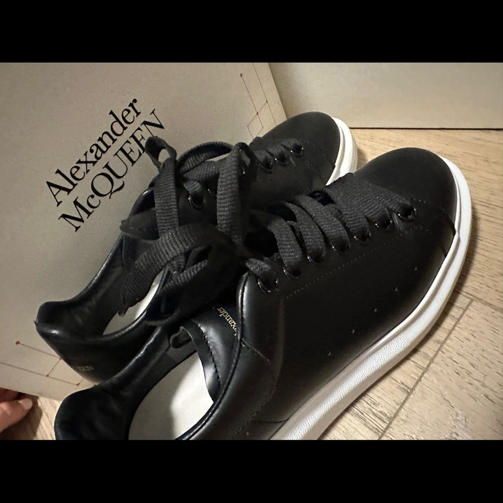 Black Alexander McQueens woman in box